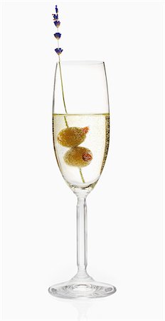 simsearch:659-06671369,k - A glass of prosecco with two olives Stock Photo - Premium Royalty-Free, Code: 659-06671465