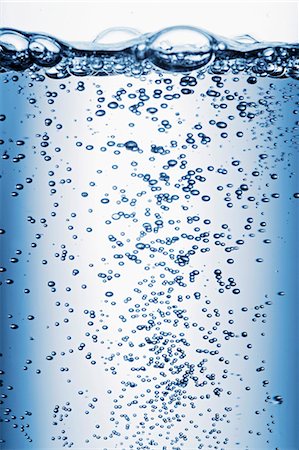 fizzing - Air bubbles rising through water (close-up) Stock Photo - Premium Royalty-Free, Code: 659-06671581