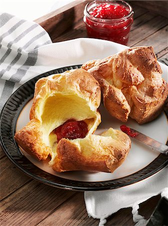 simsearch:659-06495148,k - Two Popovers on a Plate; One Split Open with Strawberry Jam Stock Photo - Premium Royalty-Free, Code: 659-06671614