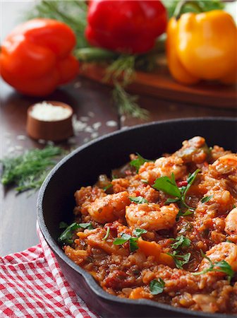 shrimp recipe - Jambalaya with Shrimp in a Cast Iron Skillet Stock Photo - Premium Royalty-Free, Code: 659-06671654