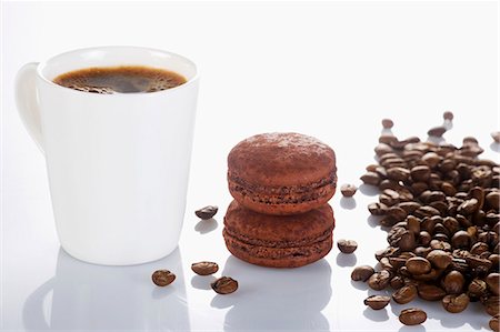 simsearch:659-06188258,k - A cup of coffee and chocolate macaroons Stock Photo - Premium Royalty-Free, Code: 659-06900758