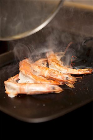 sauteeing - Cooking Stock Photo - Premium Royalty-Free, Code: 659-06900979