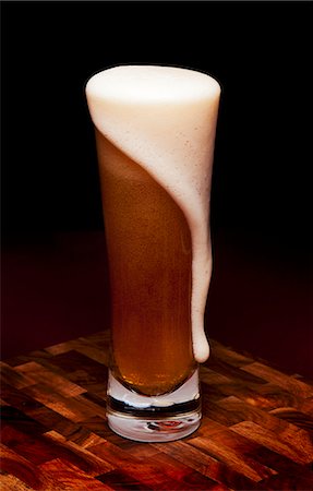 simsearch:659-03527539,k - Glass Mug of Beer with Foam Spilling Over Stock Photo - Premium Royalty-Free, Code: 659-06901421