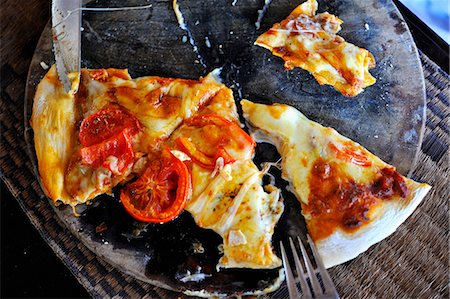 pizza birds eye view - The remains of Pizza Margerita (seen from above) Stock Photo - Premium Royalty-Free, Code: 659-06901440