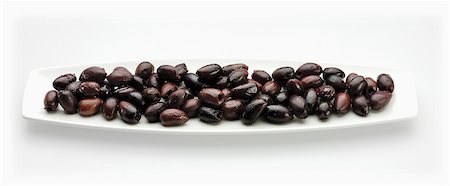 sin hacer - Pitted Kalamata Olives on a Dish Foto de stock - Sin royalties Premium, Código: 659-06901493