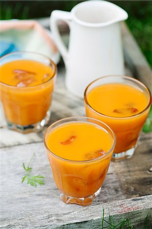 Apple, orange and carrot juice Stock Photo - Premium Royalty-Free, Code: 659-06901658