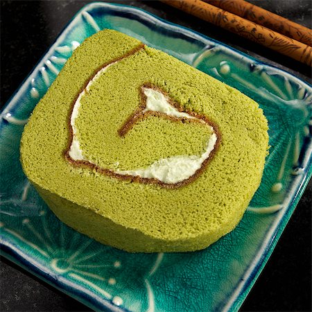 pudding - Japanese Green Tea Roll Wheat Cake with Chocolate and Butter Cream Stock Photo - Premium Royalty-Free, Code: 659-06901746