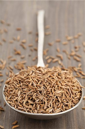 simsearch:659-06153233,k - A spoon full of cumin seeds Stock Photo - Premium Royalty-Free, Code: 659-06901761