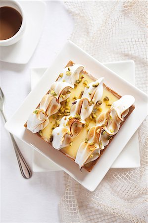fruit cake top view - A lemon meringue slice Stock Photo - Premium Royalty-Free, Code: 659-06901795