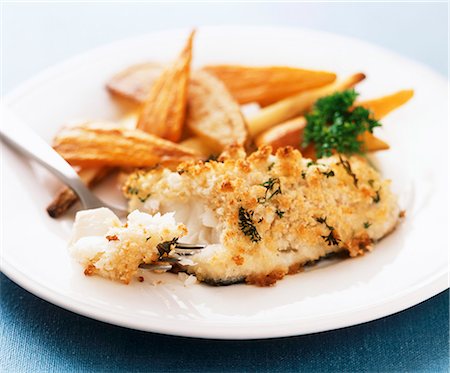 restos de comida - Fish fillet with a herb crust and roasted carrots and parsnips Foto de stock - Sin royalties Premium, Código: 659-06901905