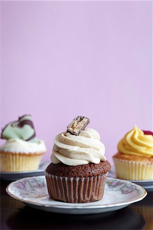 Three different cupcakes Stock Photo - Premium Royalty-Free, Code: 659-06902117