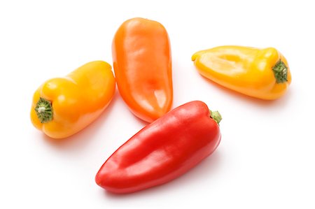 Four mini-peppers Stock Photo - Premium Royalty-Free, Code: 659-06902235