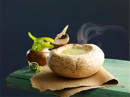 Cream of mushrooms soup served in a scooped out mushroom cap Stock Photo - Premium Royalty-Free, Code: 659-06902341