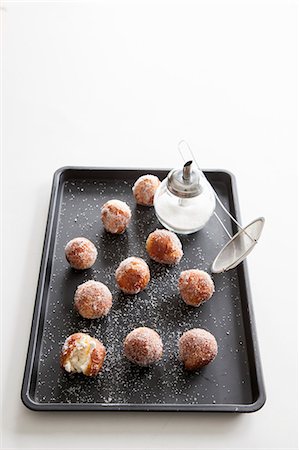 Mini doughnuts with sugar Foto de stock - Sin royalties Premium, Código: 659-06902379