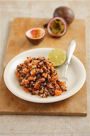 simsearch:659-06495483,k - Smoked salmon tartar with black lentils and passion fruit Photographie de stock - Premium Libres de Droits, Code: 659-06902432