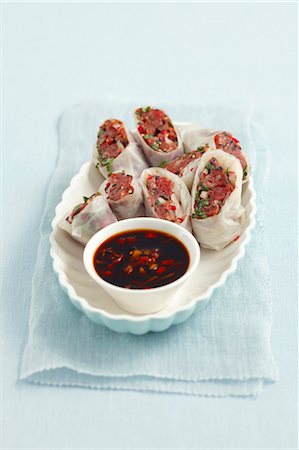 Rice paper rolls with beef tartar Stock Photo - Premium Royalty-Free, Code: 659-06902440