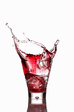 drink - Campari spilling out a glass Stock Photo - Premium Royalty-Free, Code: 659-06902470