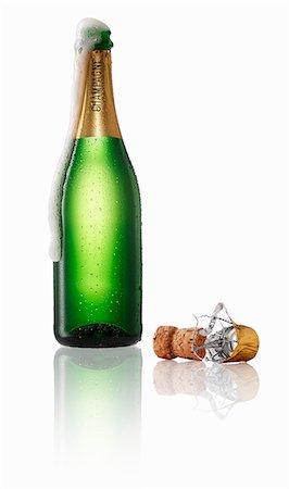 silhouette bottle wine - Champagne bubbling out of the bottle Stock Photo - Premium Royalty-Free, Code: 659-06902564
