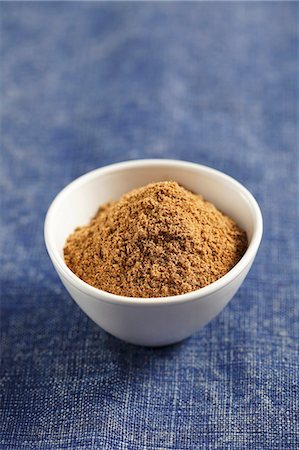 simsearch:659-08419233,k - A small bowl of ground cumin Stock Photo - Premium Royalty-Free, Code: 659-06902817