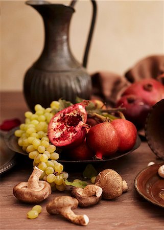 Assorted Fruit and Vegetables on a Rustic Table Stock Photo - Premium Royalty-Free, Code: 659-06902875