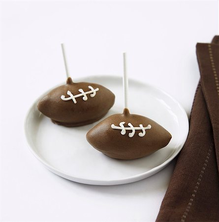 simple dish - Two Football Cake Pops on a Plate Stock Photo - Premium Royalty-Free, Code: 659-06902893