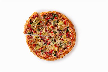 simsearch:659-06902609,k - Veggie Pizza Sliced Once on a White Background; From Above Photographie de stock - Premium Libres de Droits, Code: 659-06902915