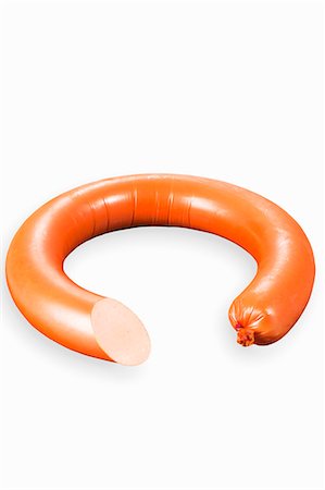 simsearch:659-06153609,k - A fine Mettwurst sausage (raw minced pork spread) in the shape of a ring Foto de stock - Sin royalties Premium, Código: 659-06903471
