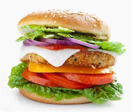 A vegetarian burger with a vegetable patty and goat's cheese (no background) Stock Photo - Premium Royalty-Free, Code: 659-06903581