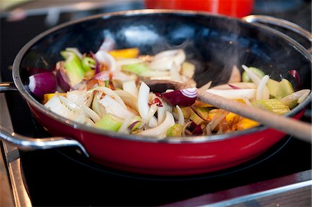 pan frying - Vegetables in a pan Stock Photo - Premium Royalty-Free, Code: 659-06903593