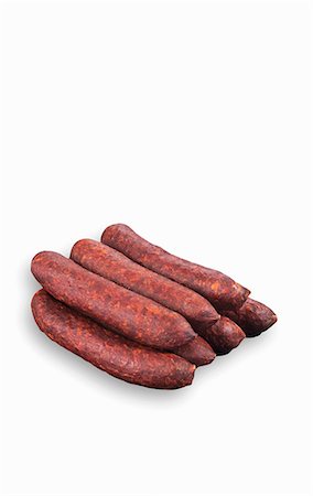simsearch:659-06902852,k - A double layer of Kaminwurz (a South Tyrolean smoked sausage) Foto de stock - Sin royalties Premium, Código: 659-06903636