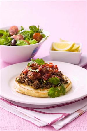 Savoury pancakes with minced meat and a side salad Stock Photo - Premium Royalty-Free, Code: 659-06903665