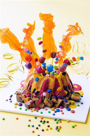 A child's birthday cake (a volcano) Stock Photo - Premium Royalty-Free, Code: 659-06903699