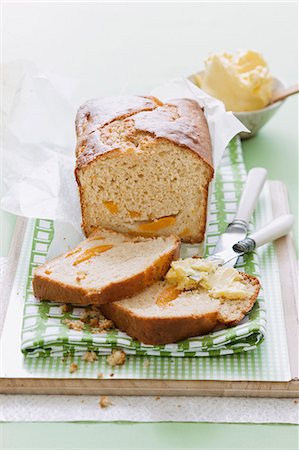spread - Peach and passion fruit bread, one slice spread with butter Stock Photo - Premium Royalty-Free, Code: 659-06903708