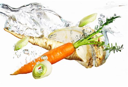 splash water - Soup vegetables falling into water Stock Photo - Premium Royalty-Free, Code: 659-06903852