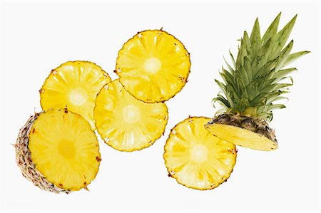 picture of pineapple - Sliced pineapple Stock Photo - Premium Royalty-Free, Code: 659-06903877