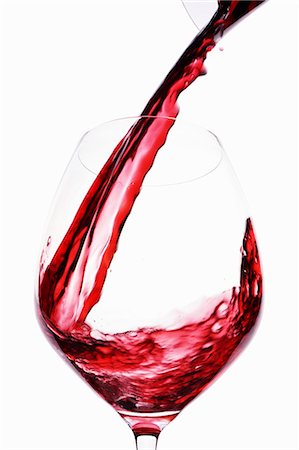 simsearch:659-06902475,k - Red Wine being poured into glass Photographie de stock - Premium Libres de Droits, Code: 659-06903934