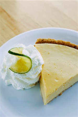 simsearch:659-07958616,k - A slice of Key Lime Pie with whipped cream Stock Photo - Premium Royalty-Free, Code: 659-07026765