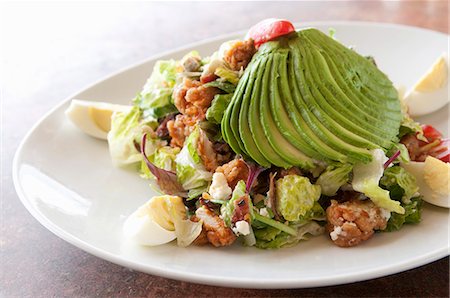 Crispy Chicken Salad with Avocado and Hard Boiled Egg Stock Photo - Premium Royalty-Free, Code: 659-07026776