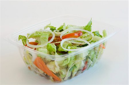 study (room) - Garden Salad in a Plastic Tao-Go Container; White Background Stock Photo - Premium Royalty-Free, Code: 659-07026773