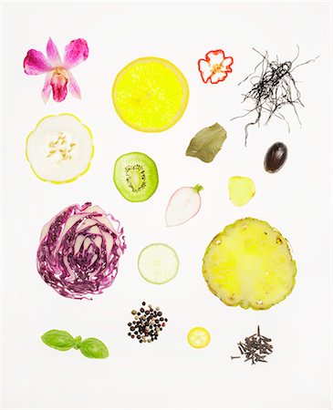 Assorted Slices of Vegetables, Fruit, Herbs and Seeds on a White Background Photographie de stock - Premium Libres de Droits, Code: 659-07026815