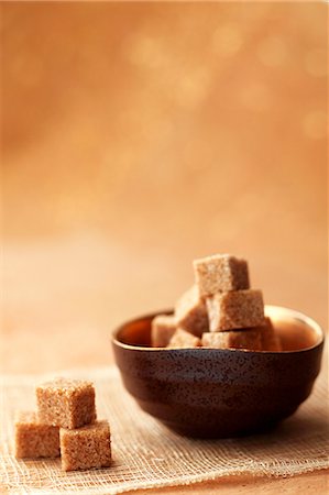 Brown sugar cubes Foto de stock - Sin royalties Premium, Código: 659-07026873