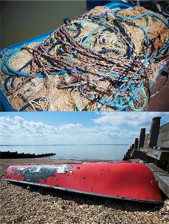 simsearch:700-03567977,k - A dual image: fishing nets and rope; an upturned boat on the beach Foto de stock - Royalty Free Premium, Número: 659-07026932