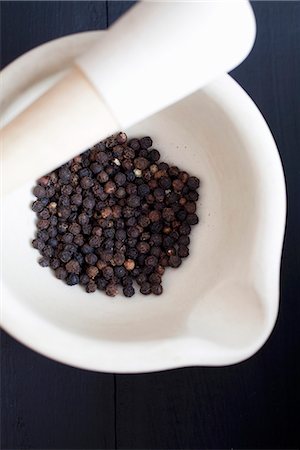 spice - Black peppercorns in a mortar Stock Photo - Premium Royalty-Free, Code: 659-07026982