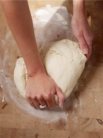 stepping - Bread dough being knead Stock Photo - Premium Royalty-Free, Code: 659-07027133