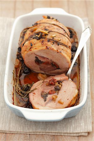 simsearch:659-07027269,k - Stuffed collar of pork with olives, sun-dried tomatoes and celery Stock Photo - Premium Royalty-Free, Code: 659-07027269