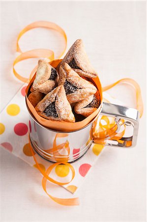 Haman parcels filled with poppy seeds Foto de stock - Sin royalties Premium, Código: 659-07027458