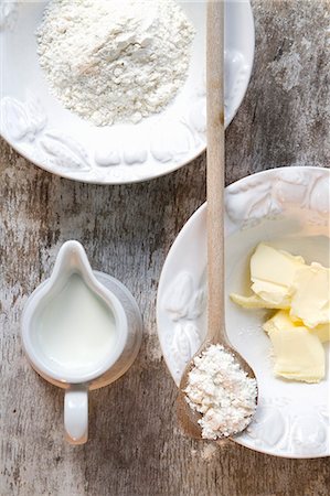 food, butter - Baking ingredients: flour, butter and milk Stock Photo - Premium Royalty-Free, Code: 659-07027635