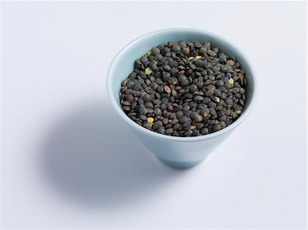 Green lentils in a bowl Foto de stock - Sin royalties Premium, Código: 659-07027730