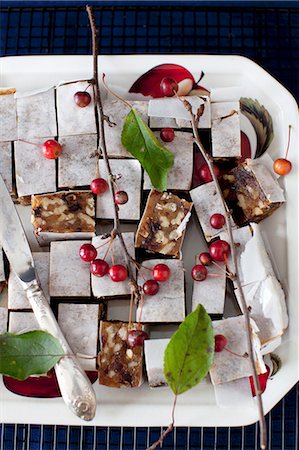 piece cake aerial view - Panforte Squares on a Platter with Berries and a Knife Stock Photo - Premium Royalty-Free, Code: 659-07028014