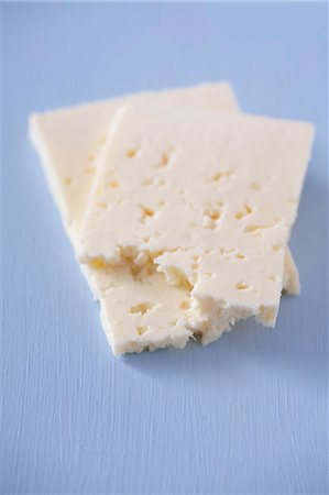 feta - Two slices of feta Foto de stock - Sin royalties Premium, Código: 659-07028081